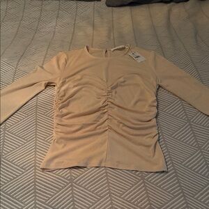 NWT figure flattering cream blouse